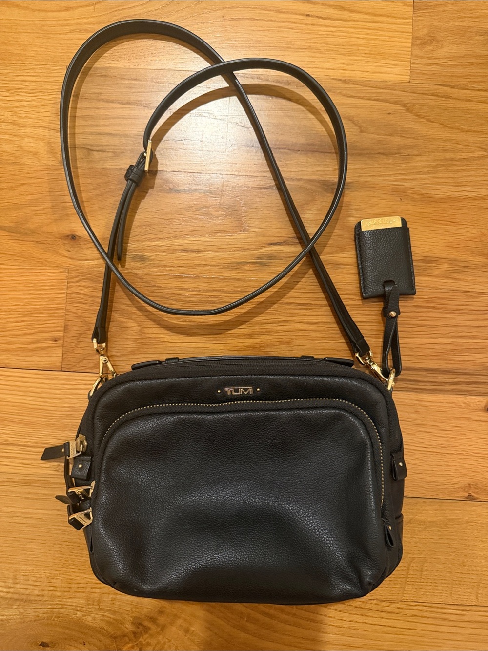 Tumi Black Leather Crossbody with Gold Hardware